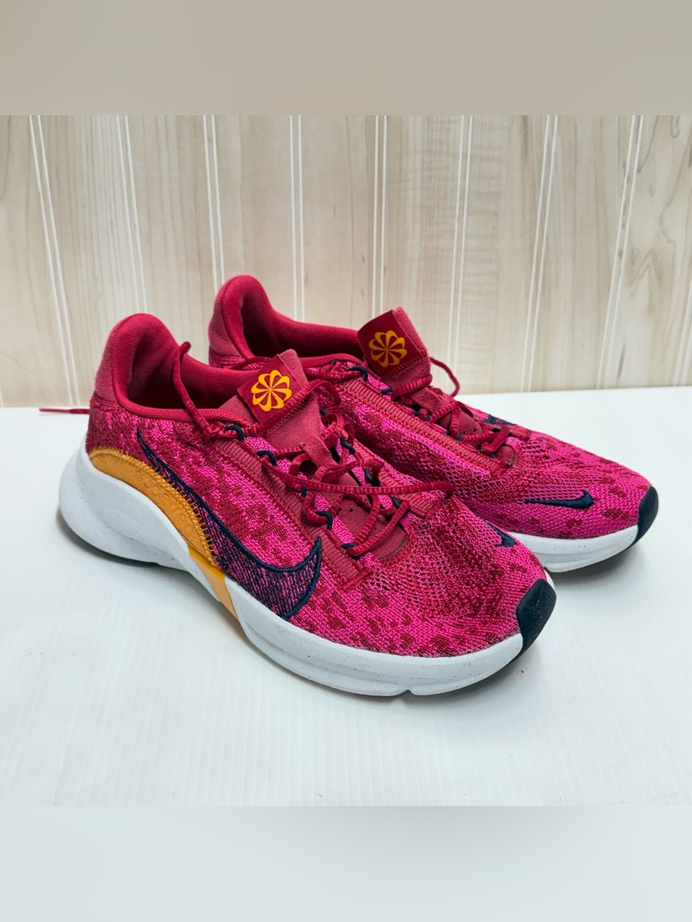 Nike Women’s Pink Athletic Sneakers with Yellow Accent